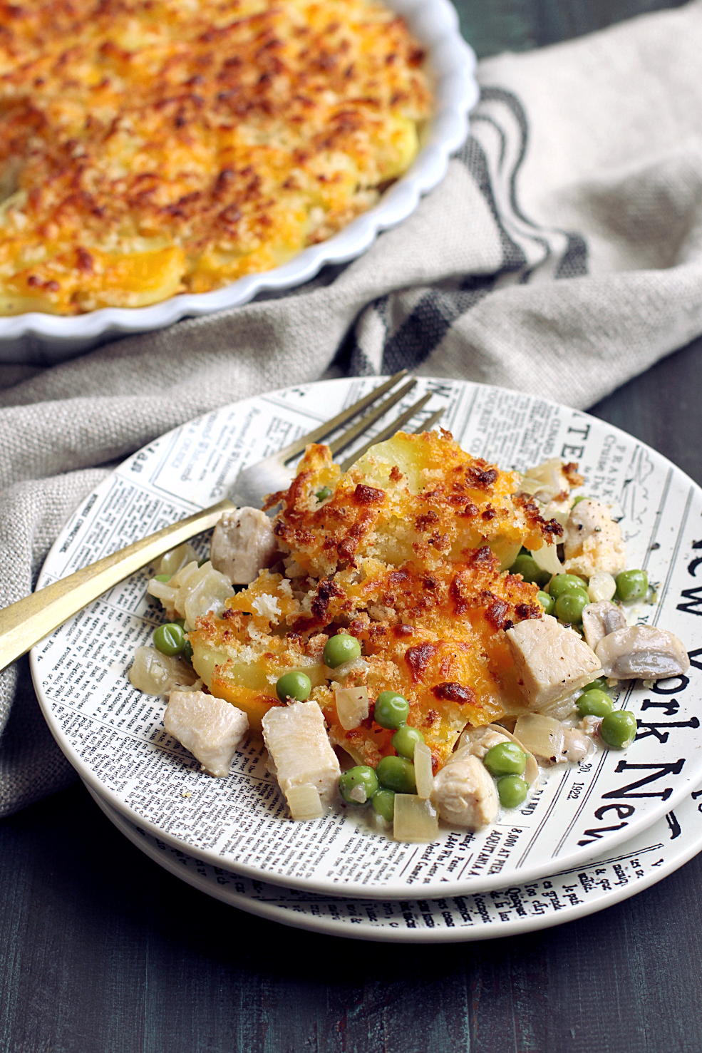 Close- up image of potato-topped chicken pot pie.