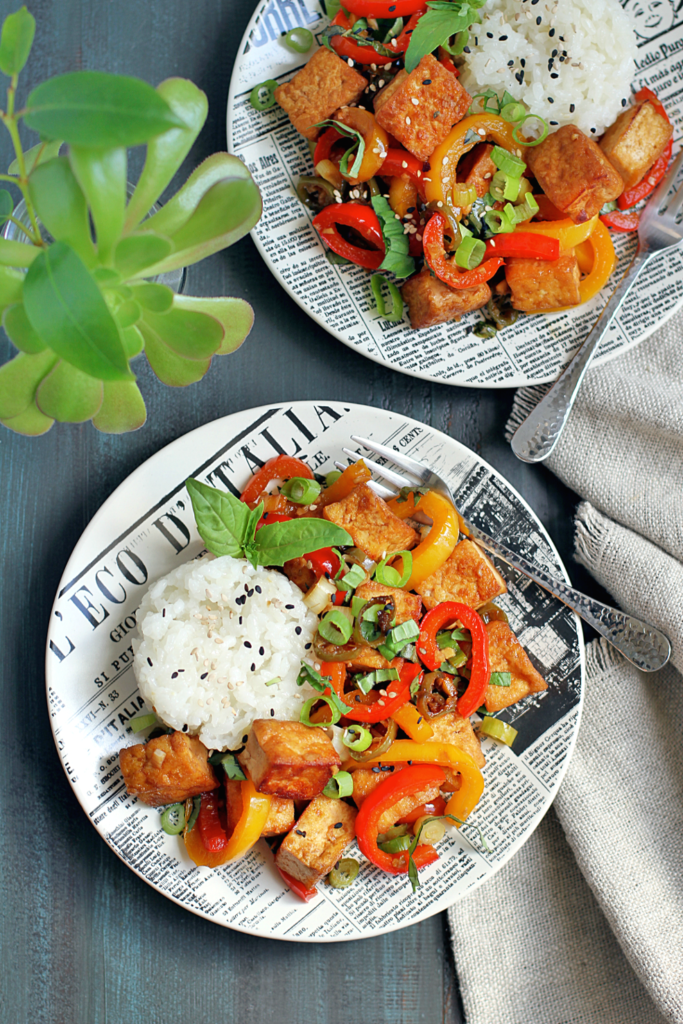 Image of spicy tofu stir-fry with coconut sticky rice.