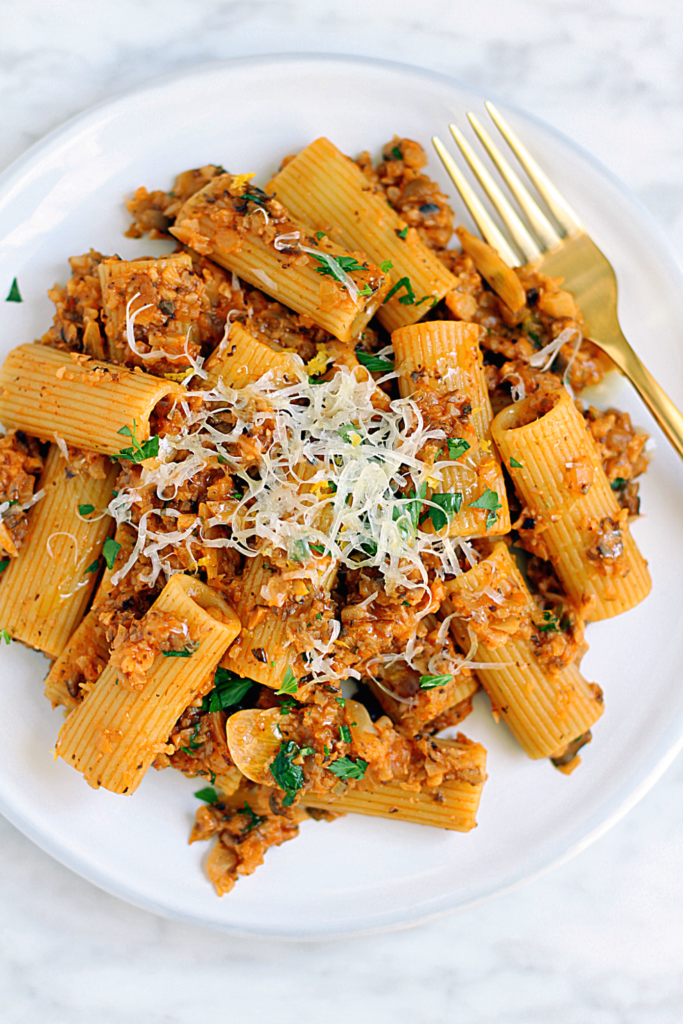 Close-up image of rigatoni with cauliflower Bolognese.