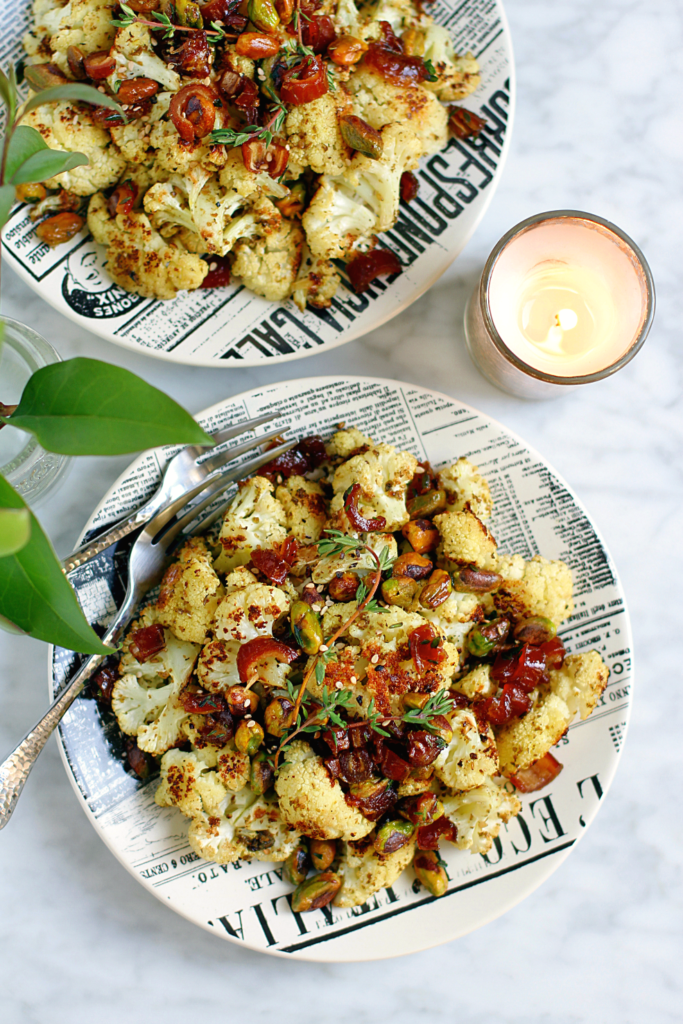 Image of za'atar roasted cauliflower with dates and pistachios.