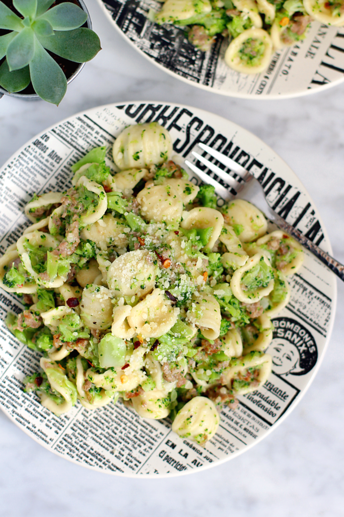 Close-up image of orecchiette with broccoli Bolognese.