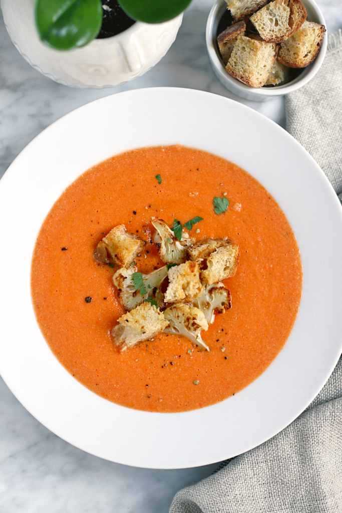 Close-up image of roasted bell pepper and cauliflower soup.