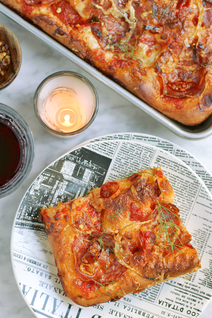 Image of a piece of soppressata and fennel grandma pie.