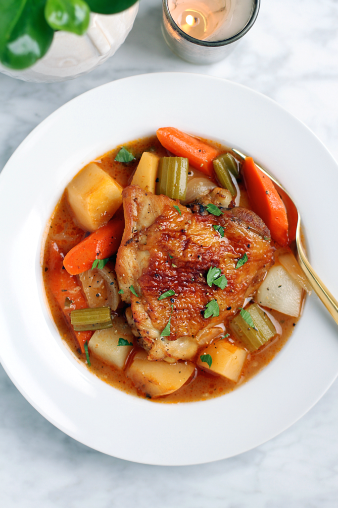 Close-up image of chicken and root vegetable stew.