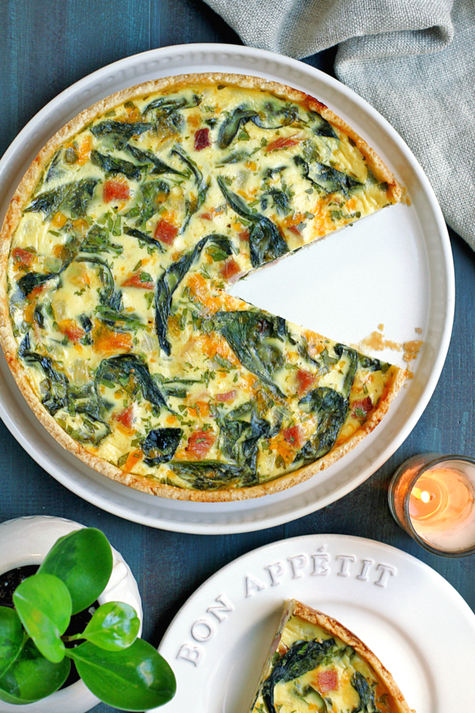 Image of spinach, ham and cheese quiche.
