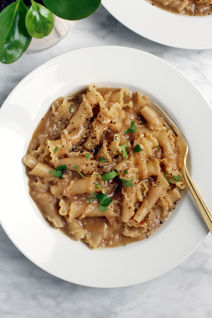 Close-up image of one-pot French onion soup pasta.
