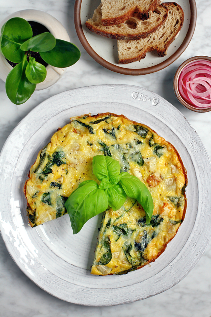 Image of frittata with greens and roasted turnips.