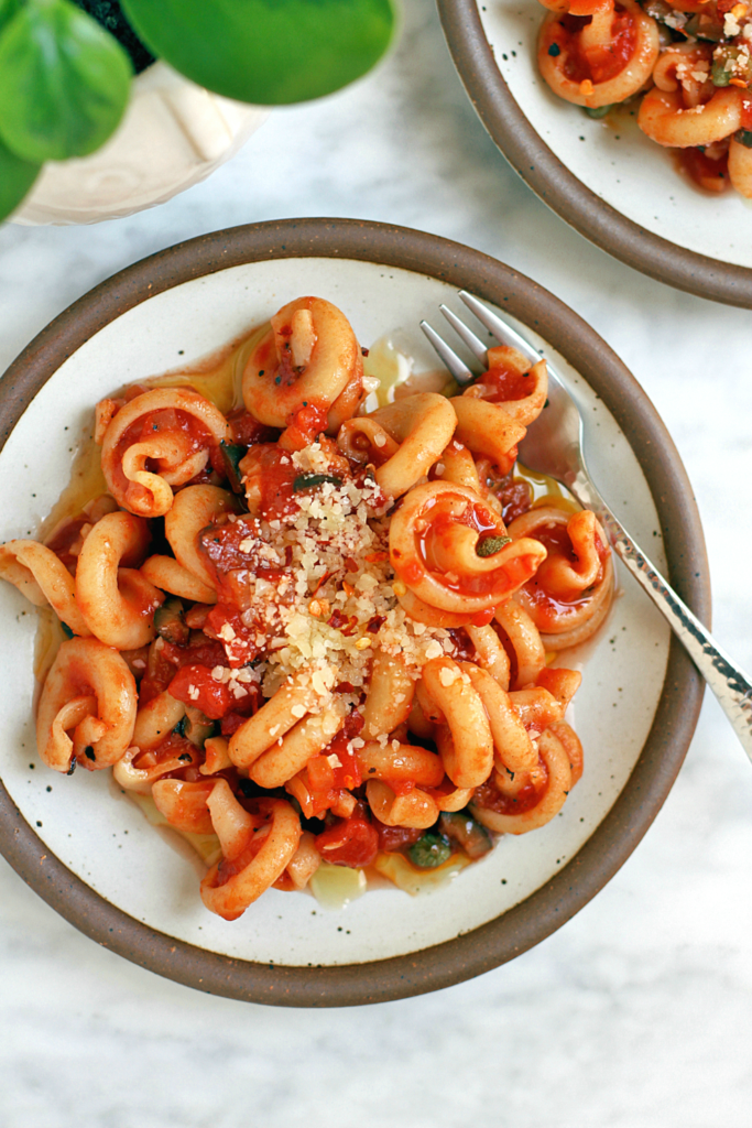 Close-up image of pasta with slightly spicy tomato sauce.
