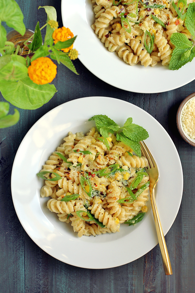 Image of creamy corn pasta with mint.