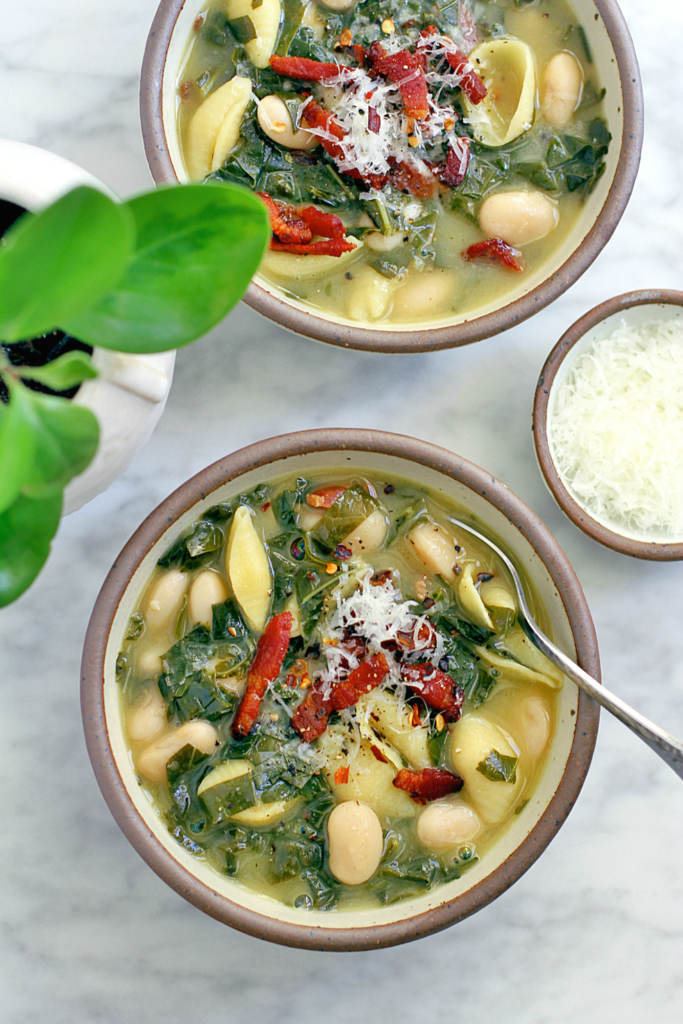 Image of pasta with bacon, greens and Italian butter beans.