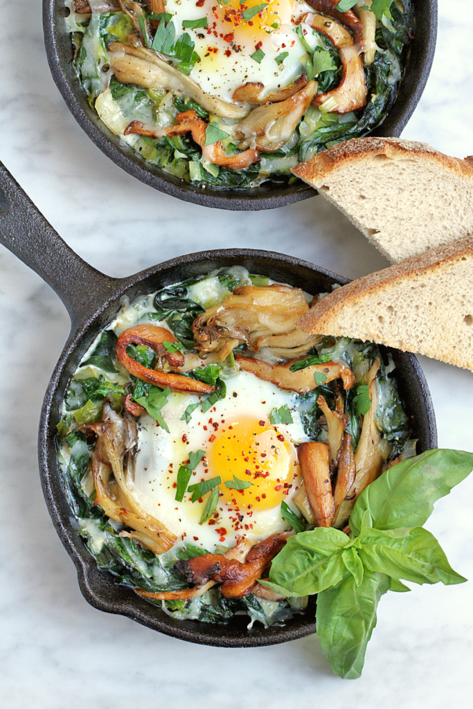 Image of baked eggs with spinach and leeks.