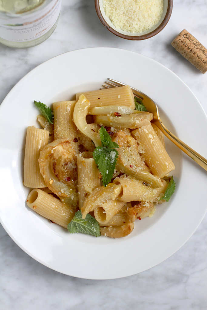 Close-up image of rigatoni with fennel and anchovies.