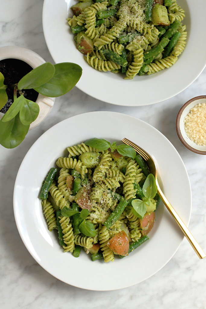 Image of pasta, green beans and potatoes with pesto.