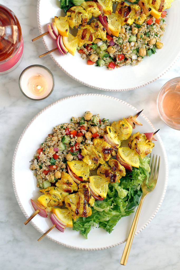 Image of grilled lemon chicken kebabs with bulgur salad.