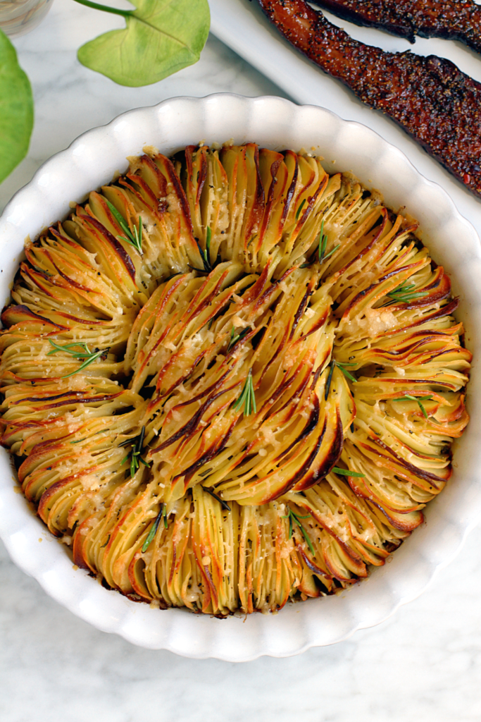 Image of rosemary garlic hasselback potatoes.