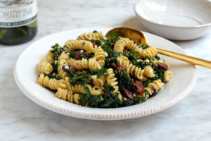 Close-up image of kale pasta salad.