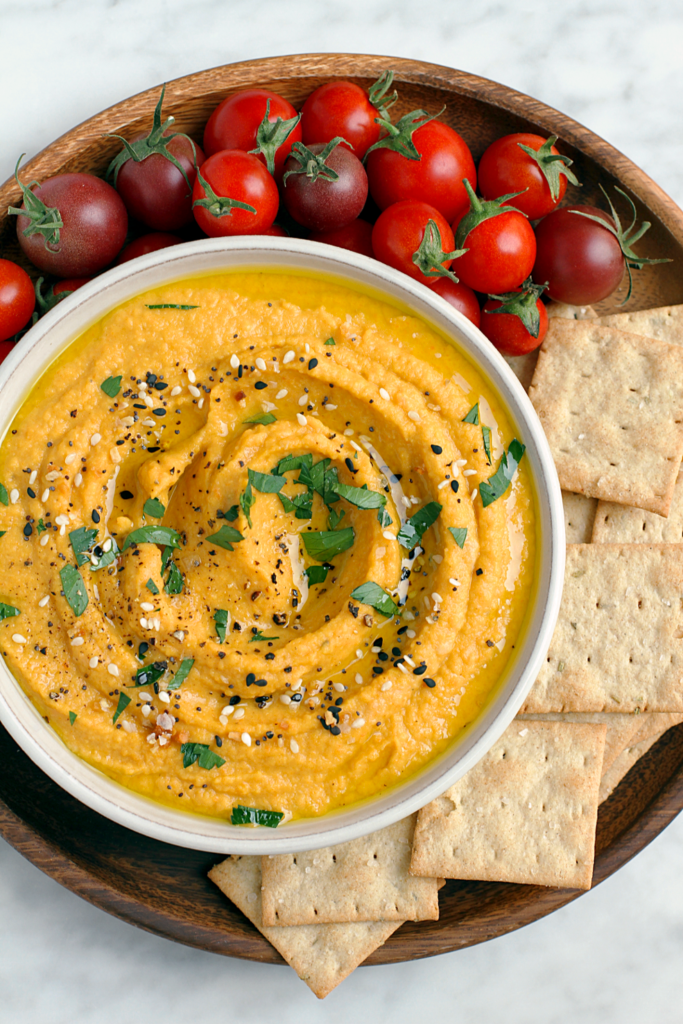 Close-up image of creamy carrot dip.