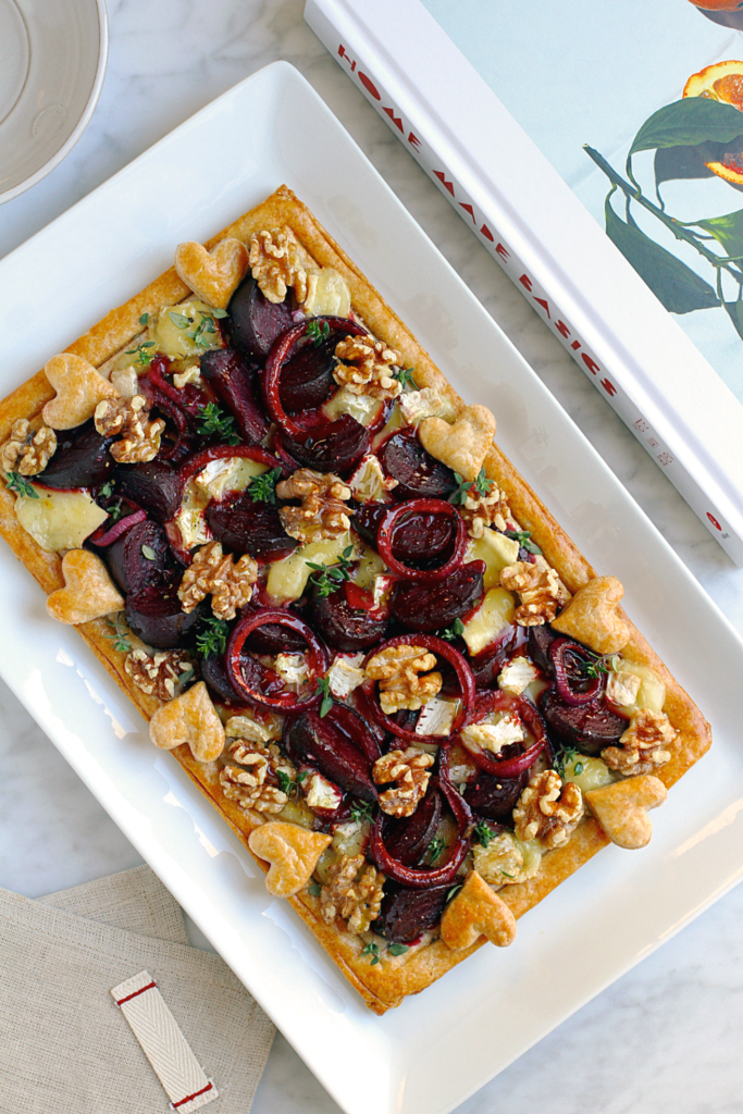 Image of beet, Camembert and walnut pie.