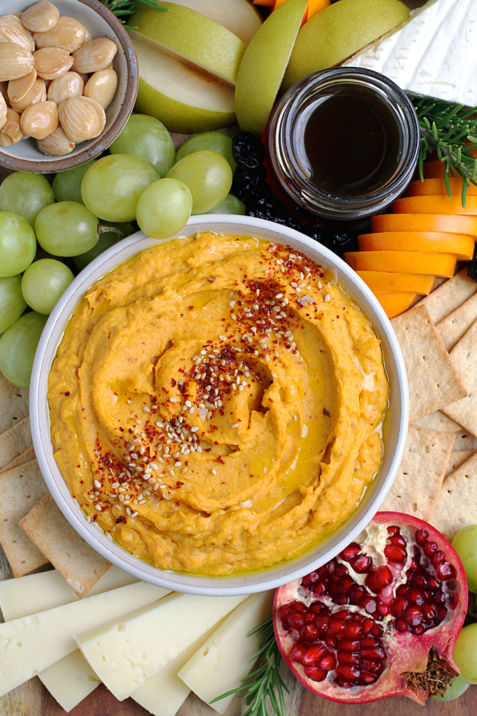 Close-up image of butternut squash and tahini dip.