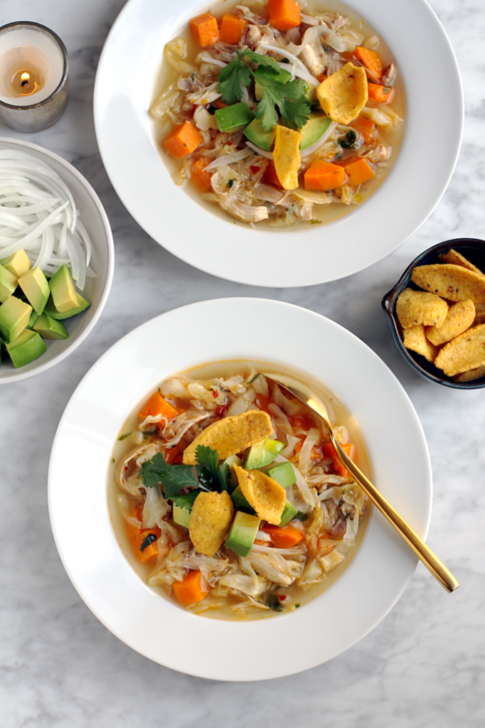 Image of chicken soup with sweet potatoes and cabbage.