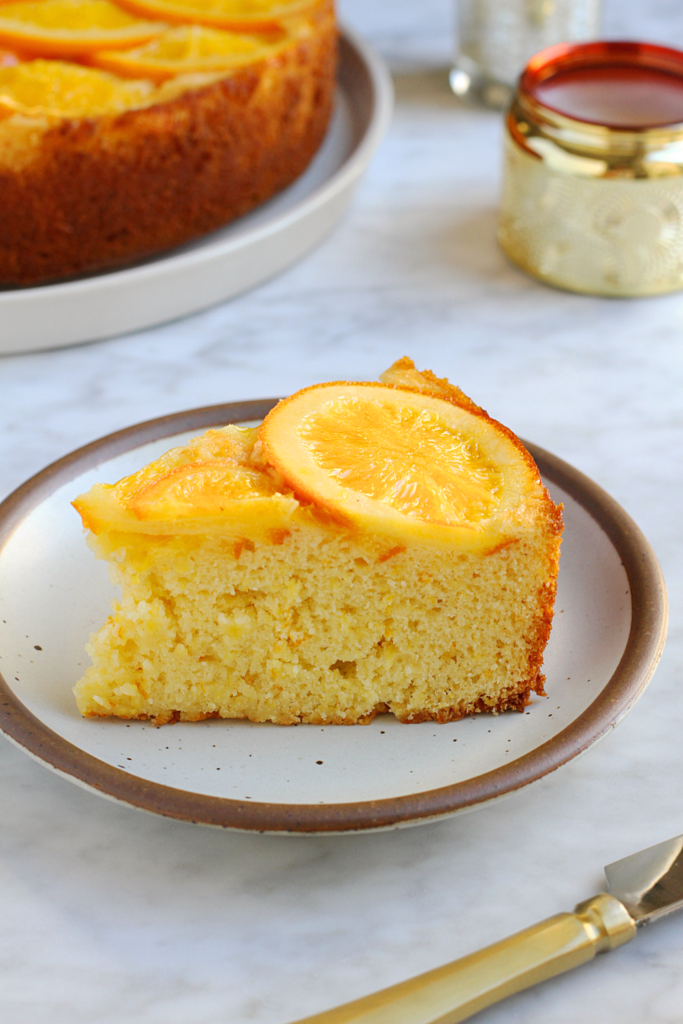 Image of a slice of Sicilian whole orange cake.