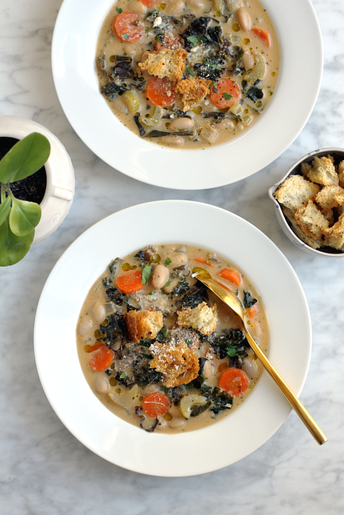 Image of vegan white bean soup with kale.