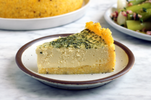 Image of a slice of polenta-crusted deep dish quiche.