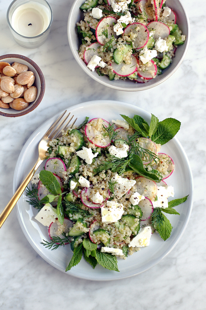 Image of quinoa salad with cucumbers and radishes.
