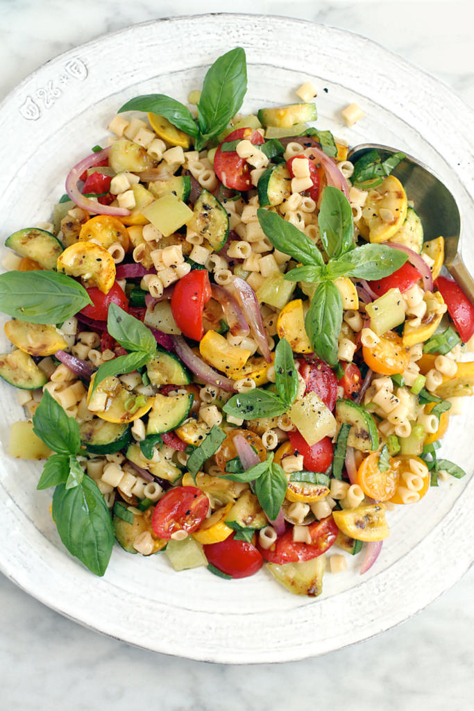 Close-up image of grilled vegetable pasta salad.