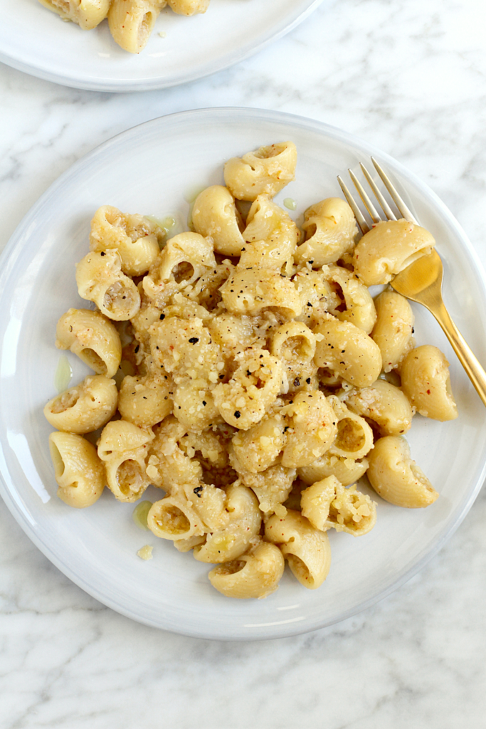 Close-up image of pasta with melted cauliflower sauce.