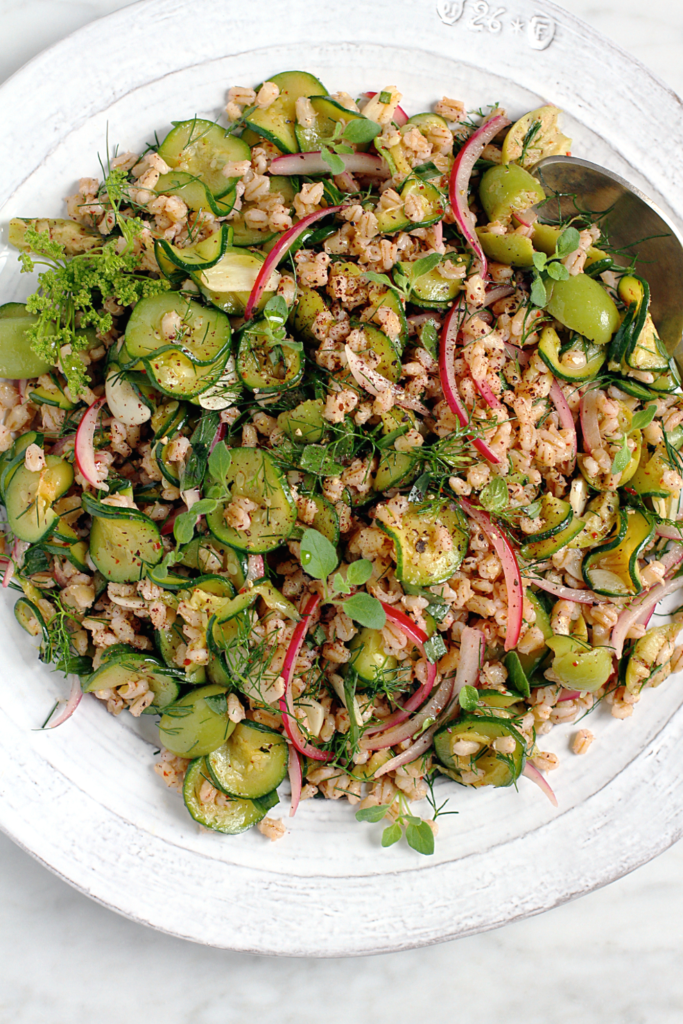Close-up image of barley with zucchini and sumac.