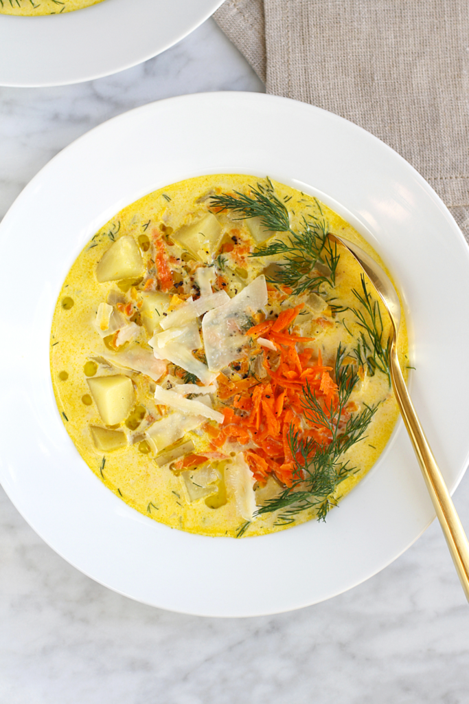 Close-up image of creamy potato and dill soup.