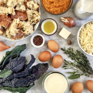 Image of ingredients for pumpkin and cheddar strata.