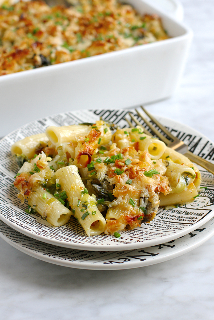 Image of baked pasta with cheddar and broccoli rabe.