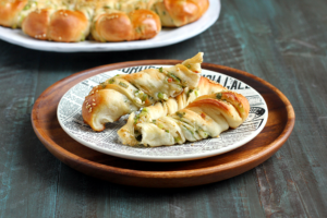 Close-up image of scallion star bread.