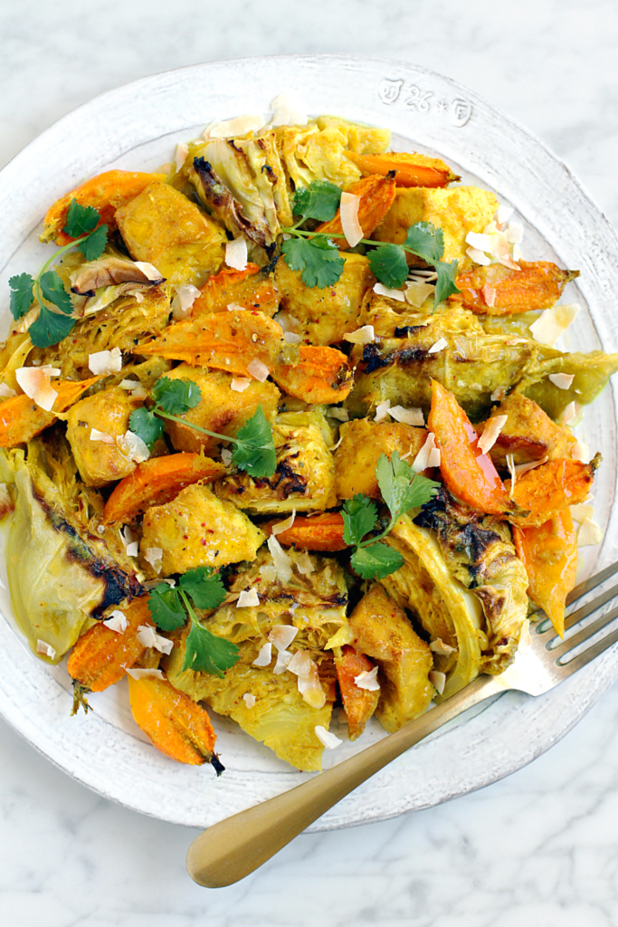 Close-up image of coconut milk-braised cabbage and tofu.