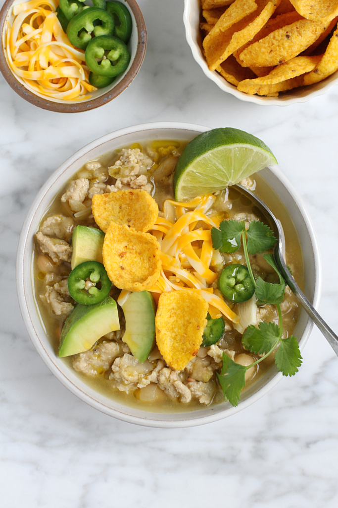 Close-up image of white chicken chili.