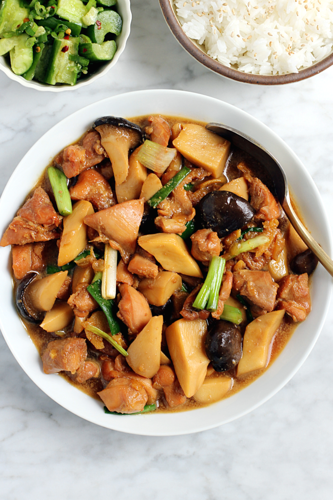 Close-up image of caramel chicken and mushrooms.